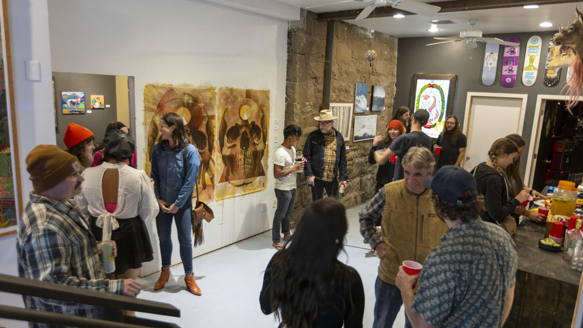 People looking at artwork during the Fall Gallery Walk Event during Durango Arts Week